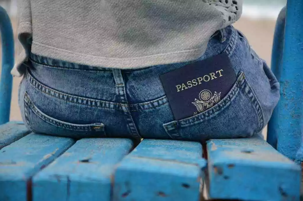 UAE Resident: Explore 100+ Visa-Free Destinations in 2025 4 A passport in back pocket of pant