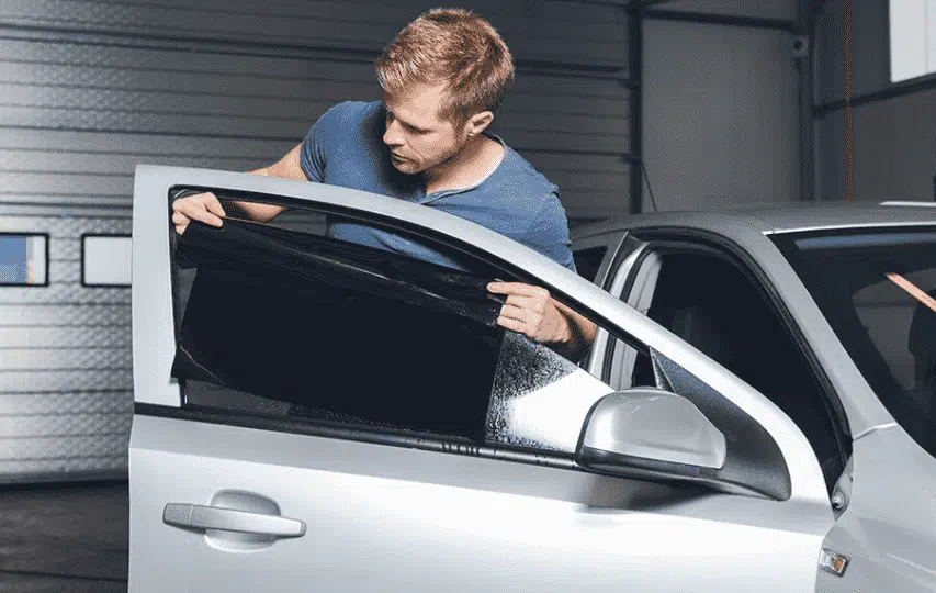 Car Window Tinting Specifications in Dubai 4 A man checking car window tinting