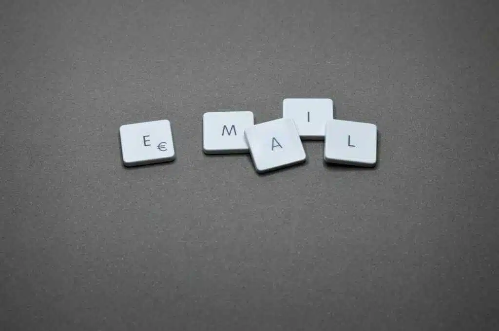NBAD Balance Inquiry UAE – 7 No-Fee Methods in 2025 25 Close-up of the word 'email' formed with letter tiles on a gray surface.