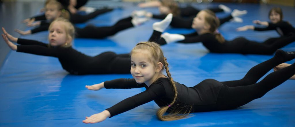 Gymnastics Classes in Dubai: What Parents Should Know 2 Some Little Girls on Floor.