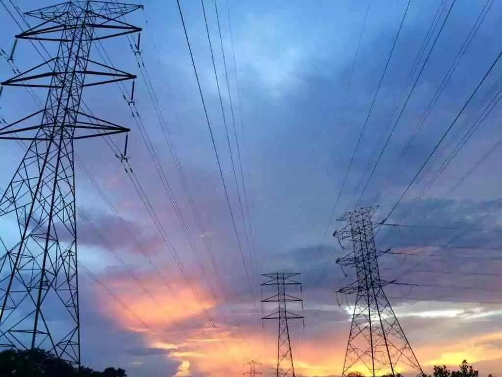 Three electricity pole in a line