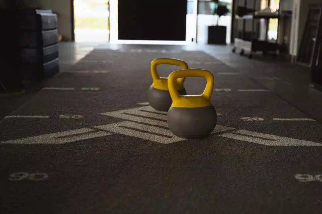 Two Kettlebells' on gym floor