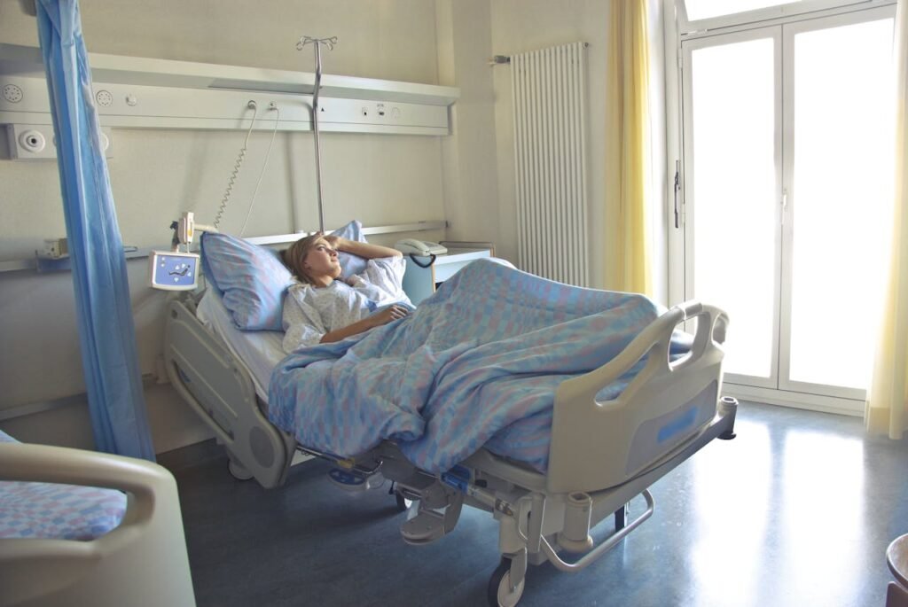 Photo of a woman lying in a hospital bed