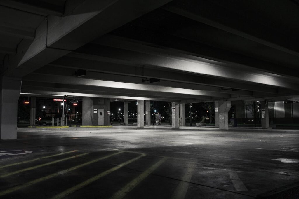 Photo of a parking spot at night