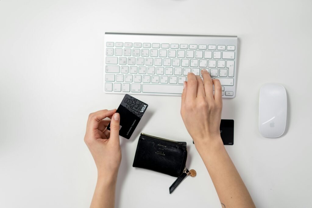 A woman having debit card in her hand