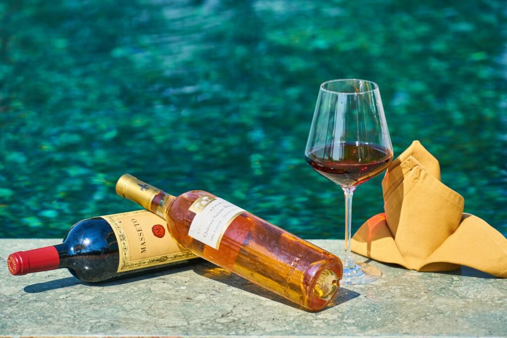 A wine glass on a swimming pool