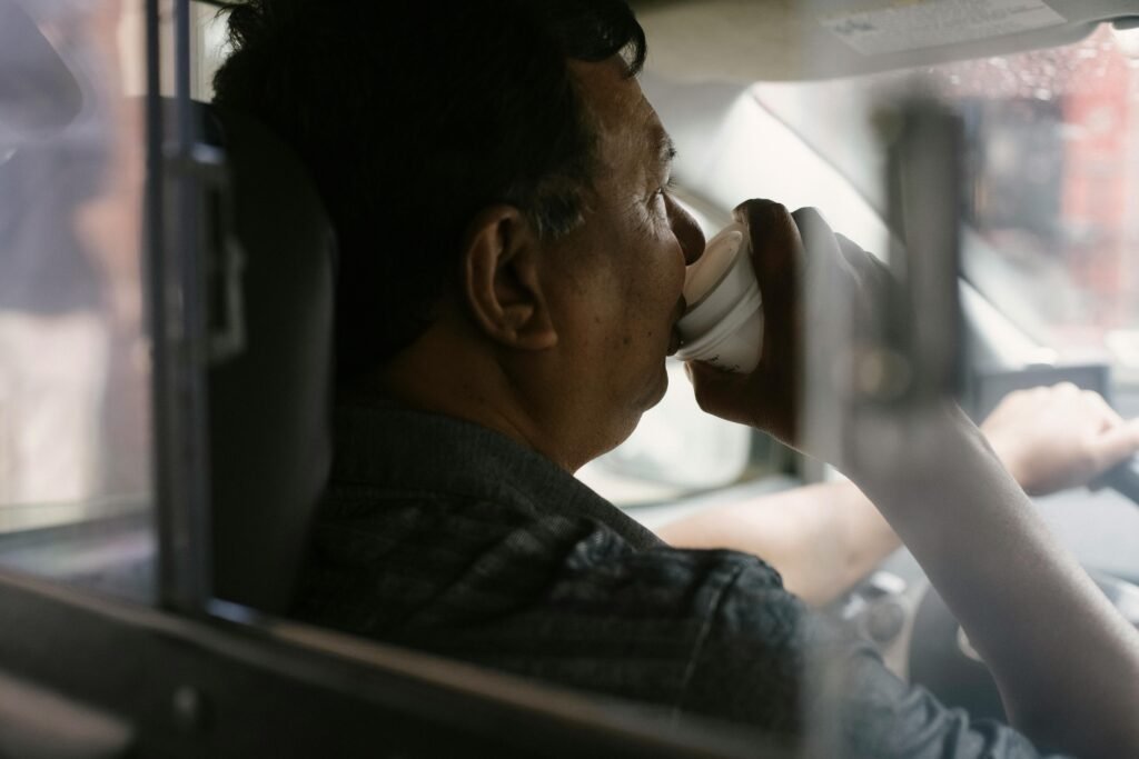 A man drinking while driving