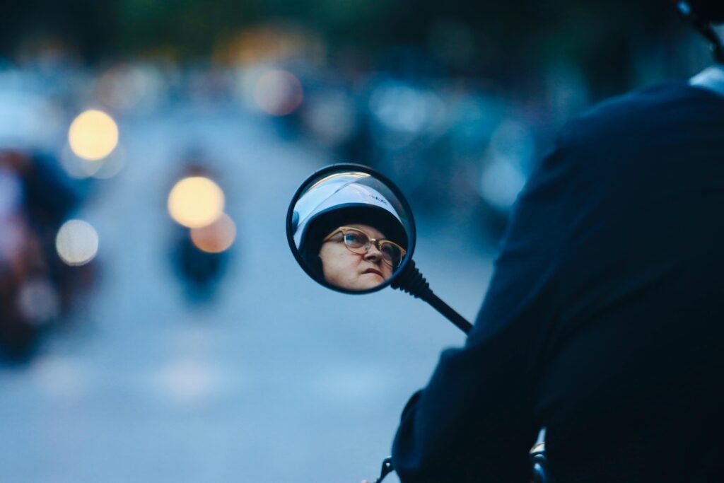 Man in Black Jacket Wearing Black Helmet