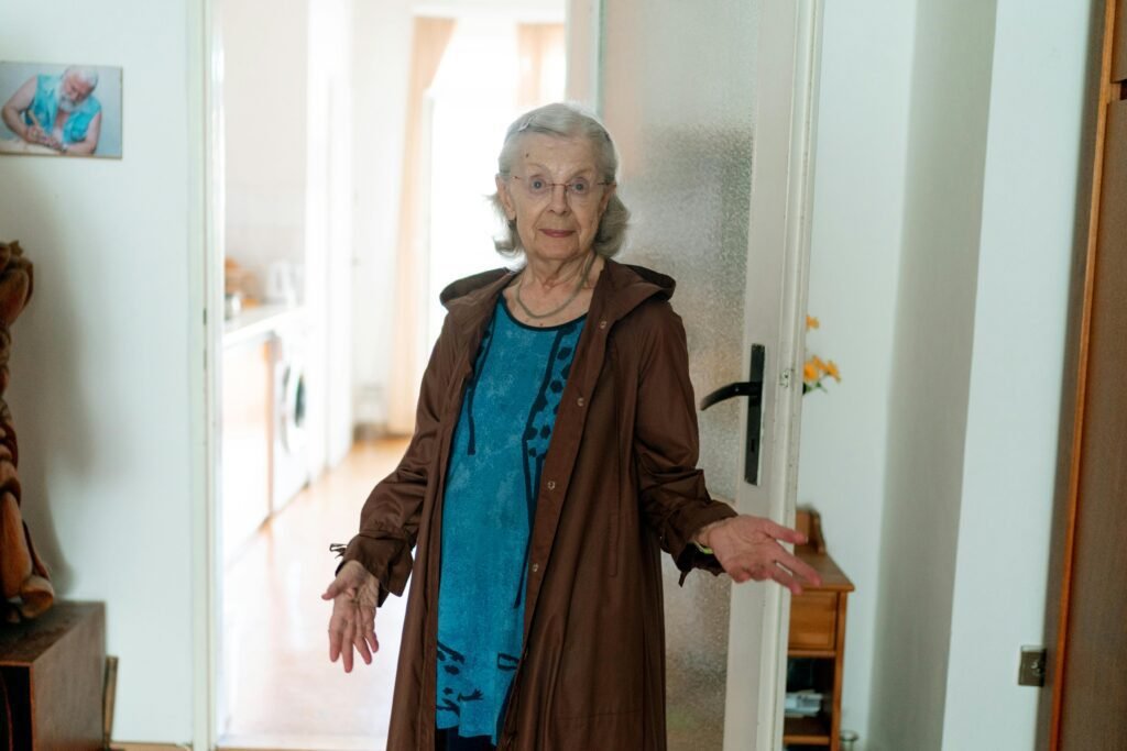 A woman standing in front of a door