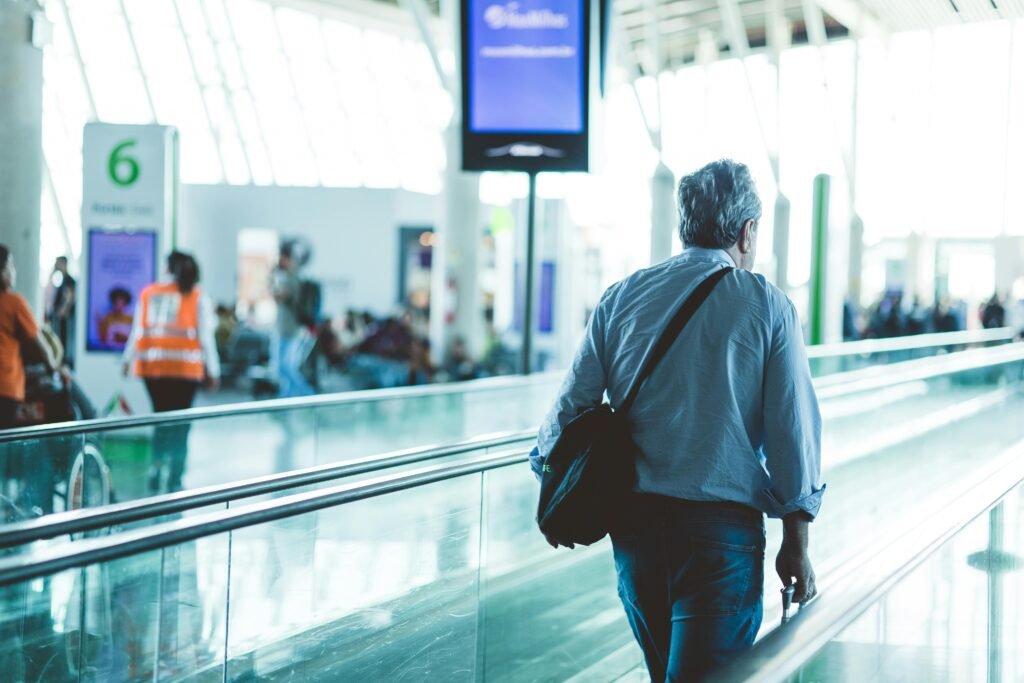 A man walking in airport.