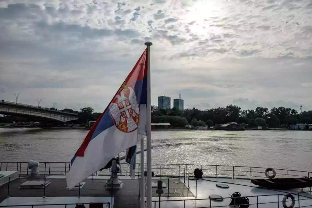 A Serbian flag on a boat.