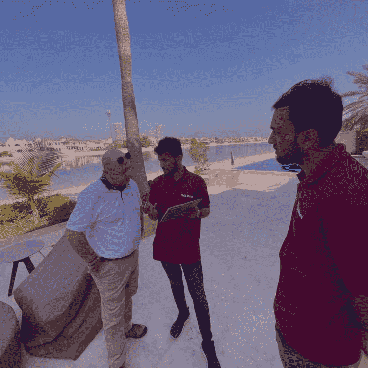 three men talking to each other