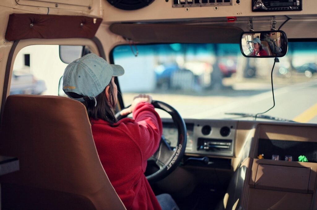 driver, woman, vehicle, bus, car, transportation, cap, travel, rear view, dashboard, car wallpapers, steering wheel